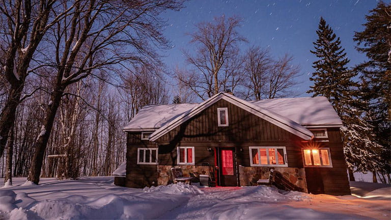 A lodge at Porcupine Mountains State Park in winter at night