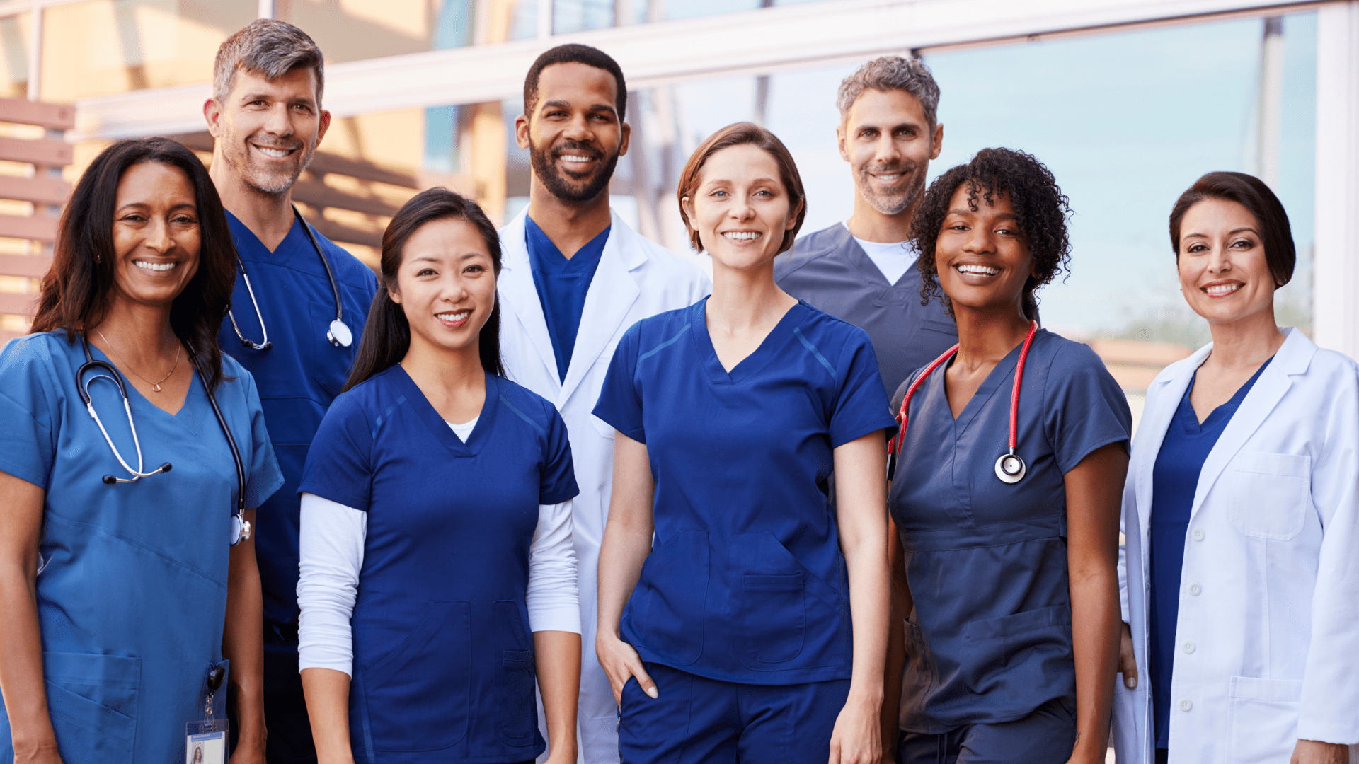 Healthcare and human services workers in a team photo.