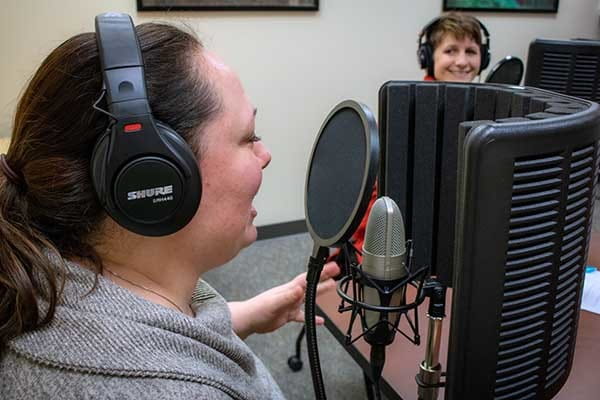 Holly Vaughn from the Wildtalk Podcast, foreground, chats about what is going on around the state with Hannah Schauer, background, for one of the podcast’s regular segments.