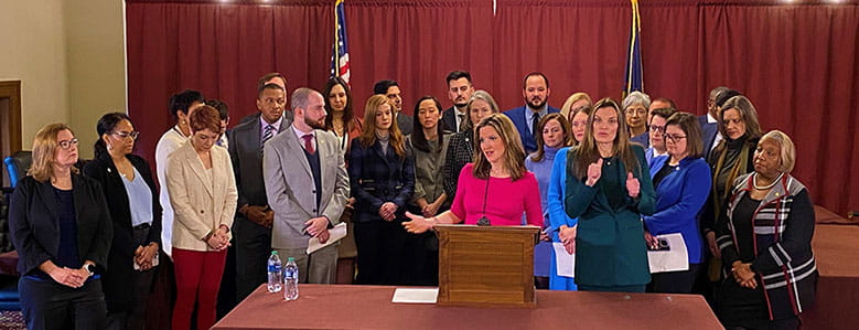 Secretary Benson with lawmakers