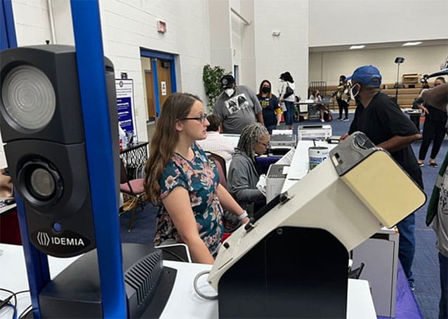 Road to Restoration Clinic April 12 2023 Lansing 01 Staff helps citizens