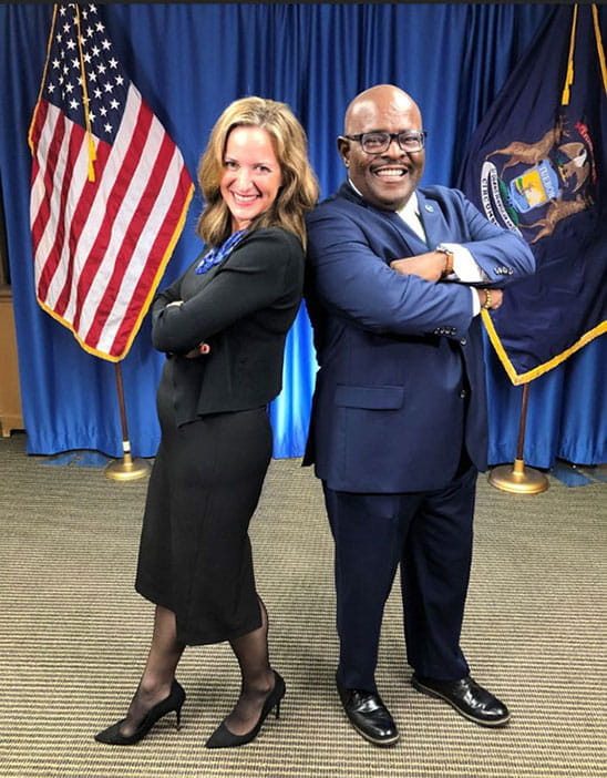 Secretary of State Jocelyn Benson and Heaster Wheeler