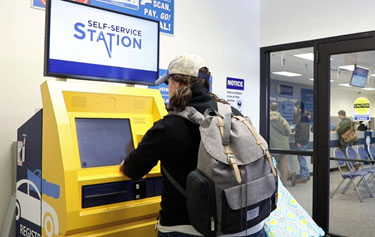 customer using Self service stations
