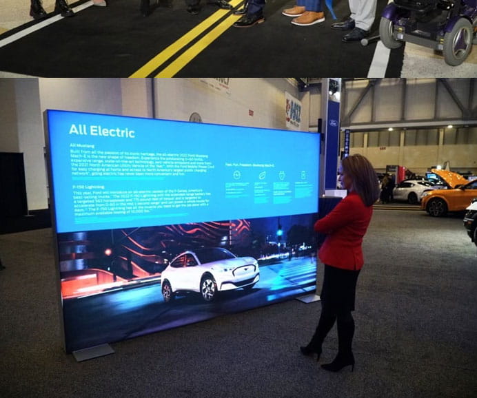 Benson reads about electric vehicles
