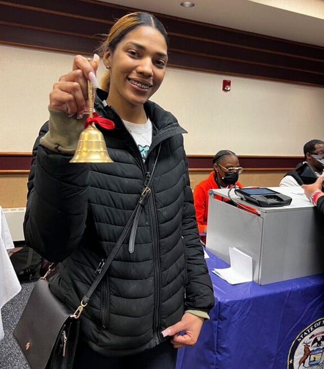 Ashley Blakely of Taylor rang the bell