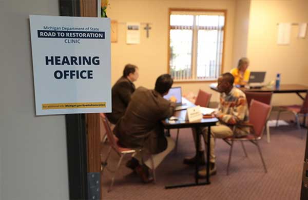 Participants review information presented by staff and volunteer attorneys