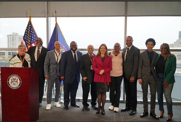 Secretary Benson poses with State and local leaders