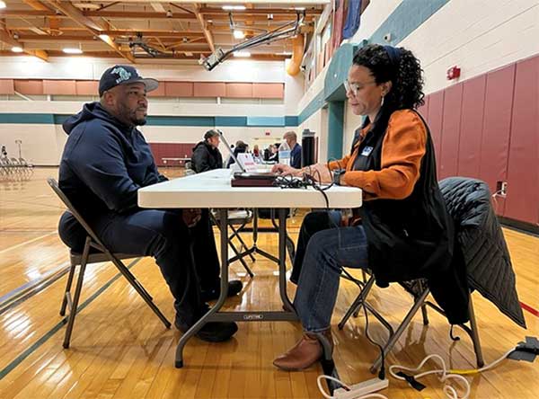 Participant receives information from staff 