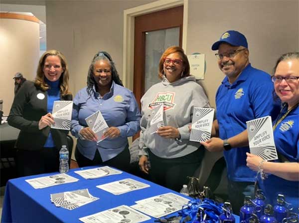 Early voting day one - Secretary Benson and a community group at the Northwest Activities Center early voting site