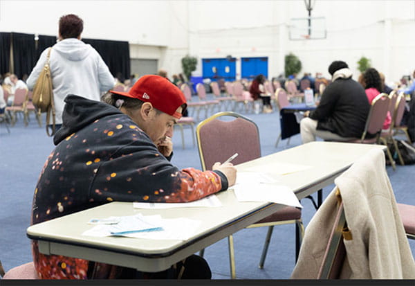 An attendee at Lansing R2R clinic in Lansing 2025