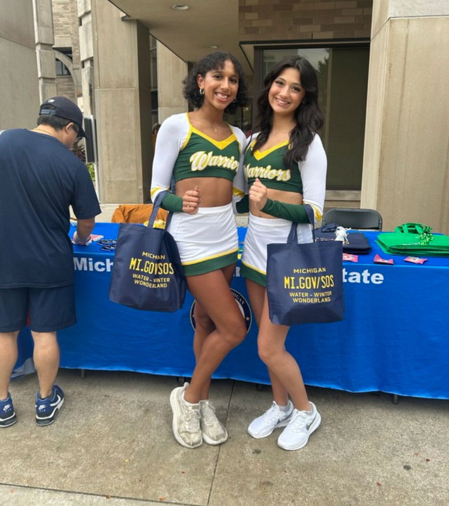 Wayne State Cheerleaders stop at Secretary of State booth