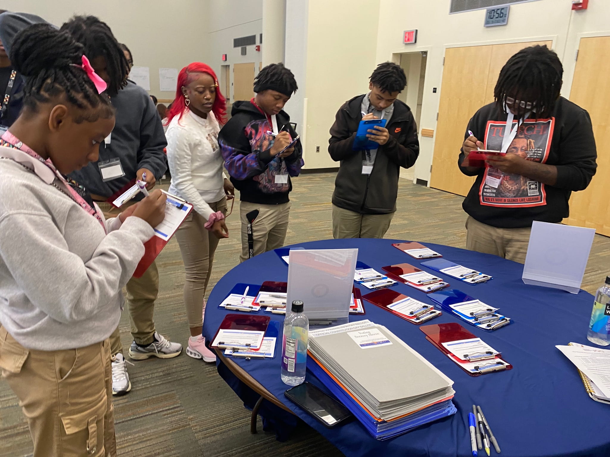 Students participating in a MiVoice MiVote session