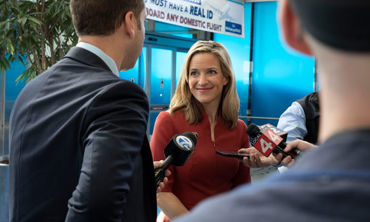 Photo  of Secretary Benson interacting with the press