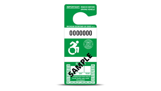 Green disability parking placard