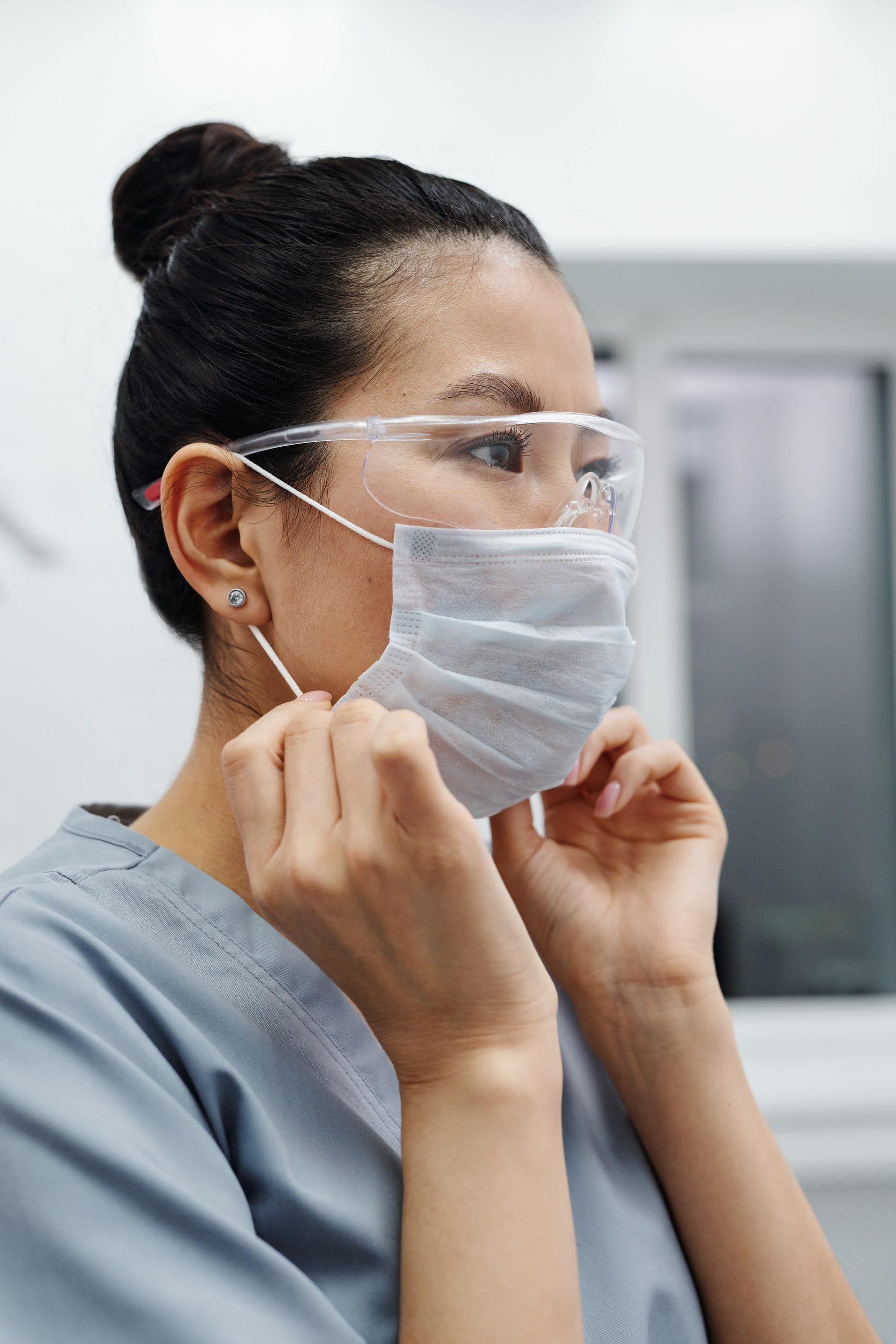 woman wearing face mask and goggles