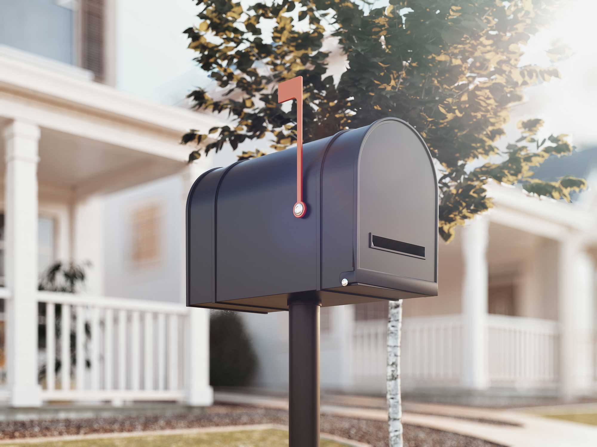 Black mailbox with flag up.