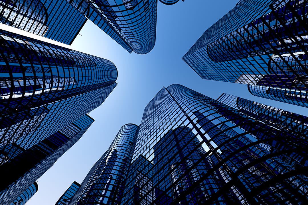 View of office buildings from the ground looking up.