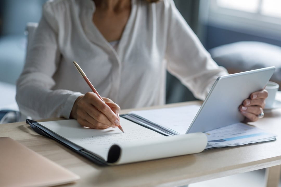 Business person reviewing paperwork