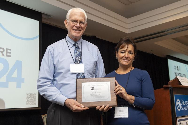Rick DeVries P.E., Asst. City Engineer, City of Grand Rapids and receiving TAMC Carmine Palombo Individual Achievement Award from TAMC Chair, Joanna Johnson.
