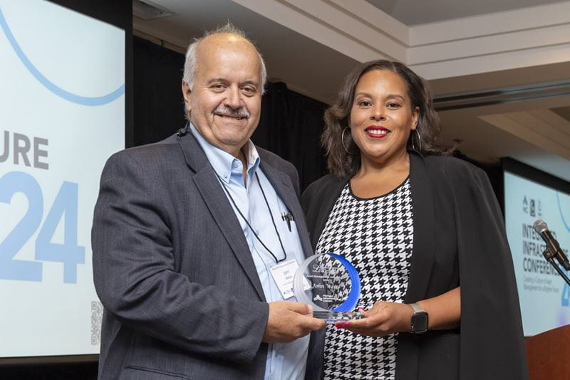 Rick DeVries P.E., Asst. City Engineer, City of Grand Rapids and receiving TAMC Carmine Palombo Individual Achievement Award from TAMC Chair, Joanna Johnson.