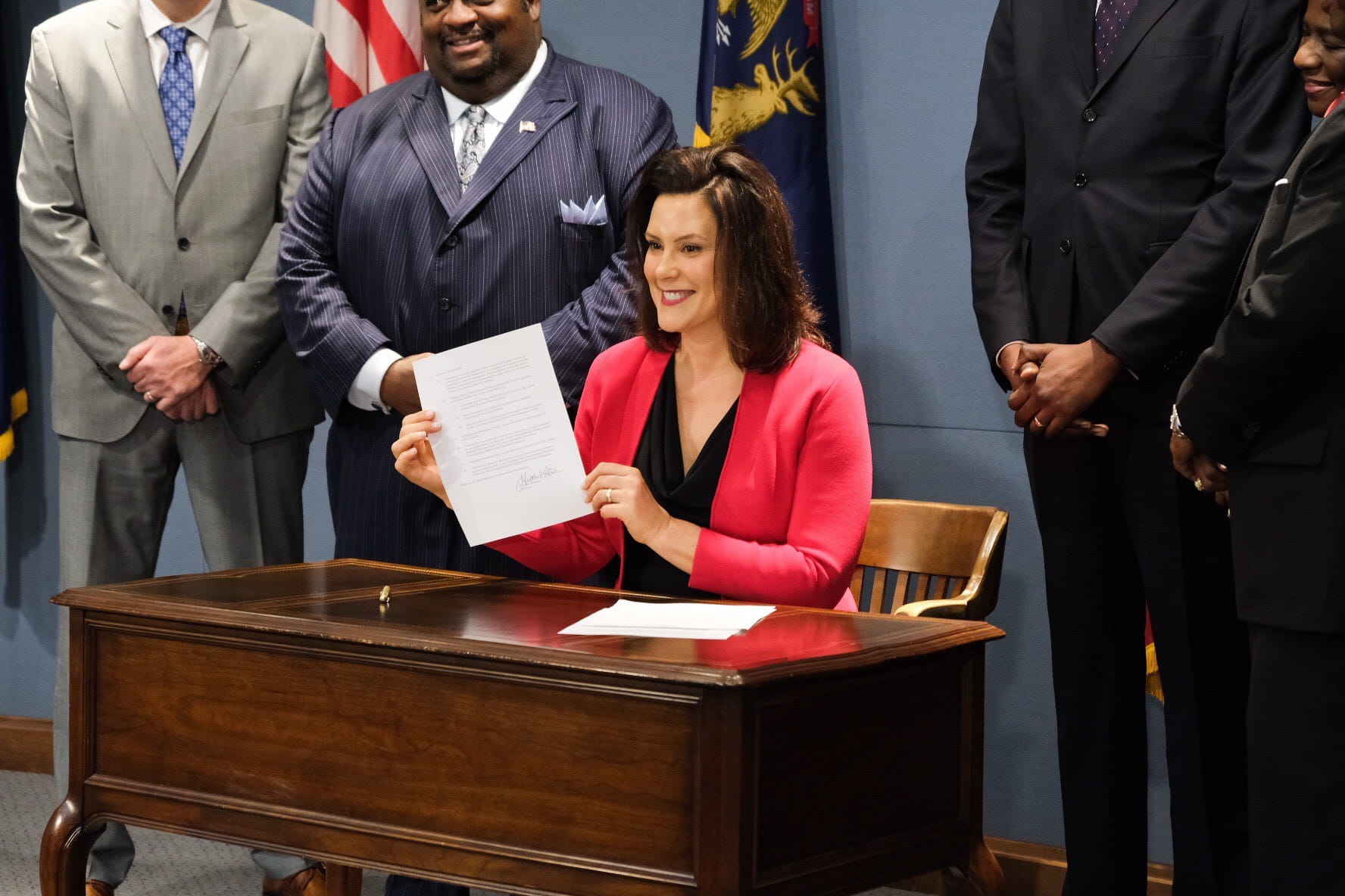 Governor Whitmer signing Executive Directive 2019-08